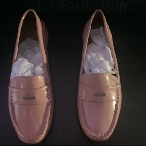 Pink Coach patent leather loafers